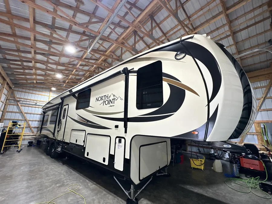 Ceramic coating on a North Point fifth wheel RV at our Concord shop