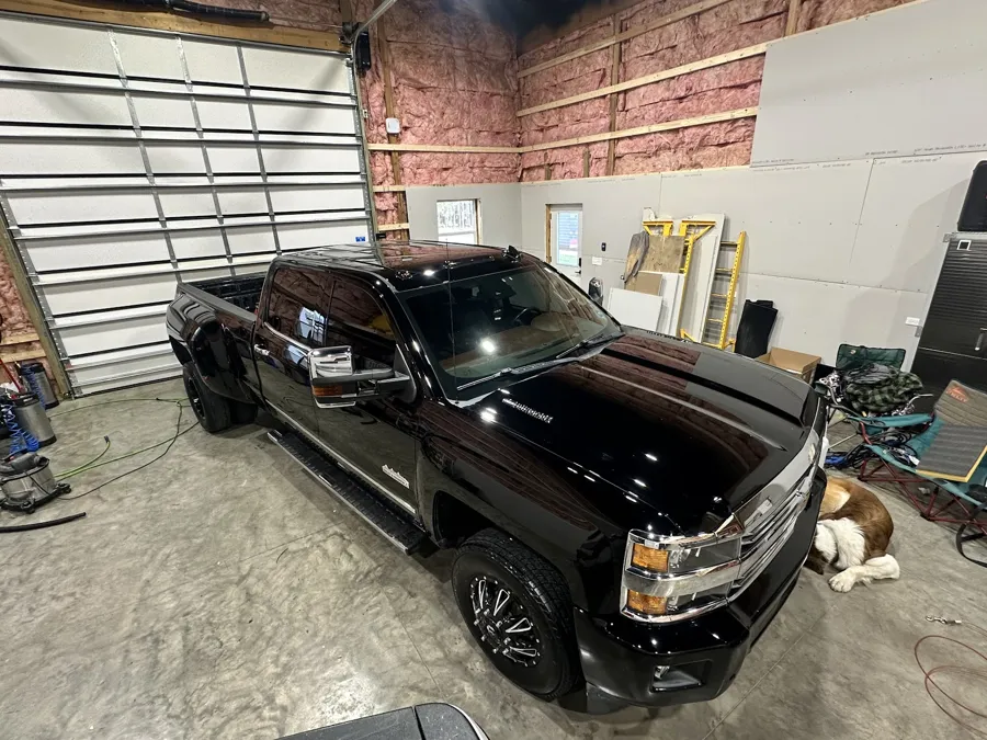 Black Chevrolet Silverado after a full detail and paint correction